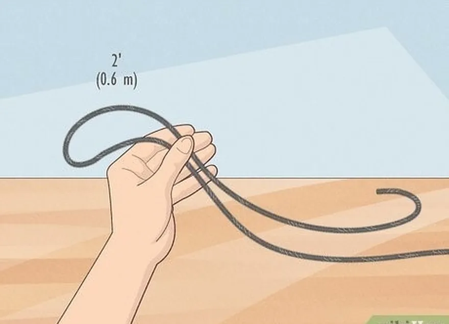 ステップ2 2フィート（0.6 m）のロープを取得します。