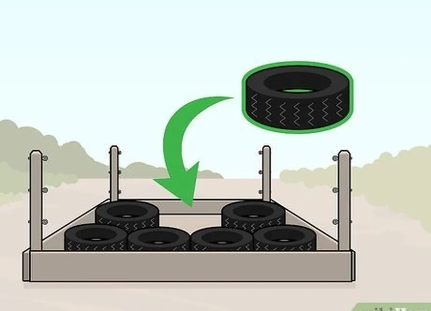 ステップ1レスリングリングフレームの下部にタイヤまたはマットレスを並べます。