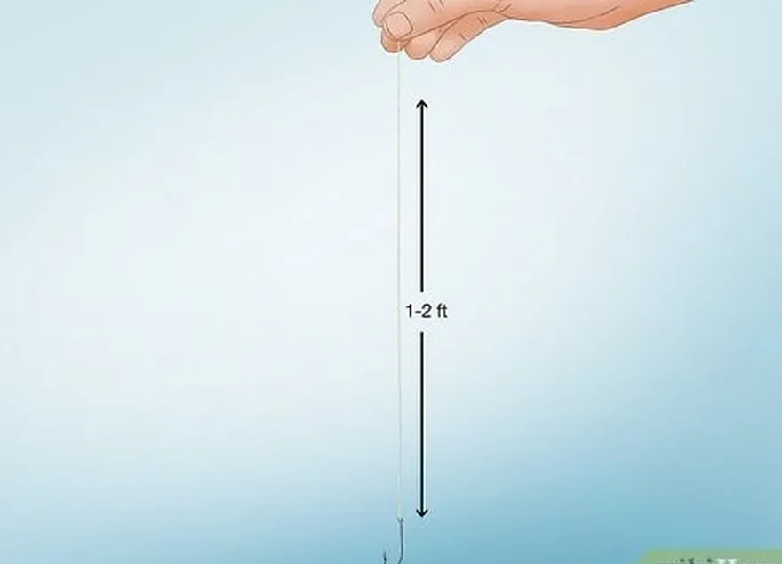 ステップ 2 1 つまたは 2 つの重りをフックから 1 ～ 2 フィート（30 ～ 61 cm）の位置に置きます。